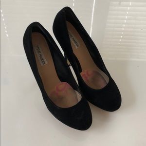 Black suede pumps